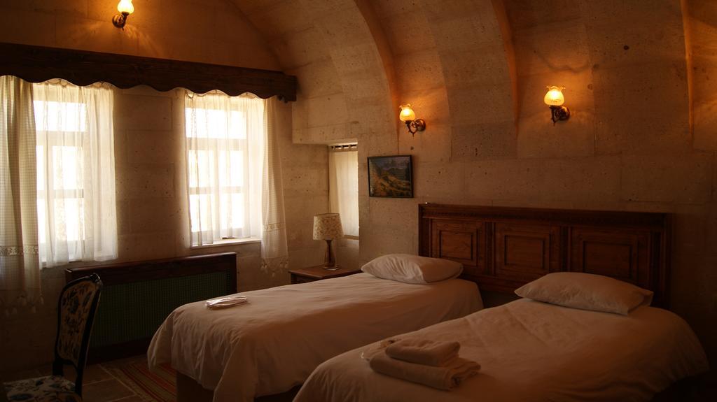 Sinasos Palace Cave Hotel Ürgüp Szoba fotó