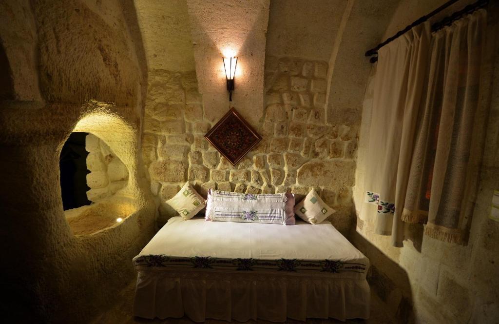 Sinasos Palace Cave Hotel Ürgüp Szoba fotó